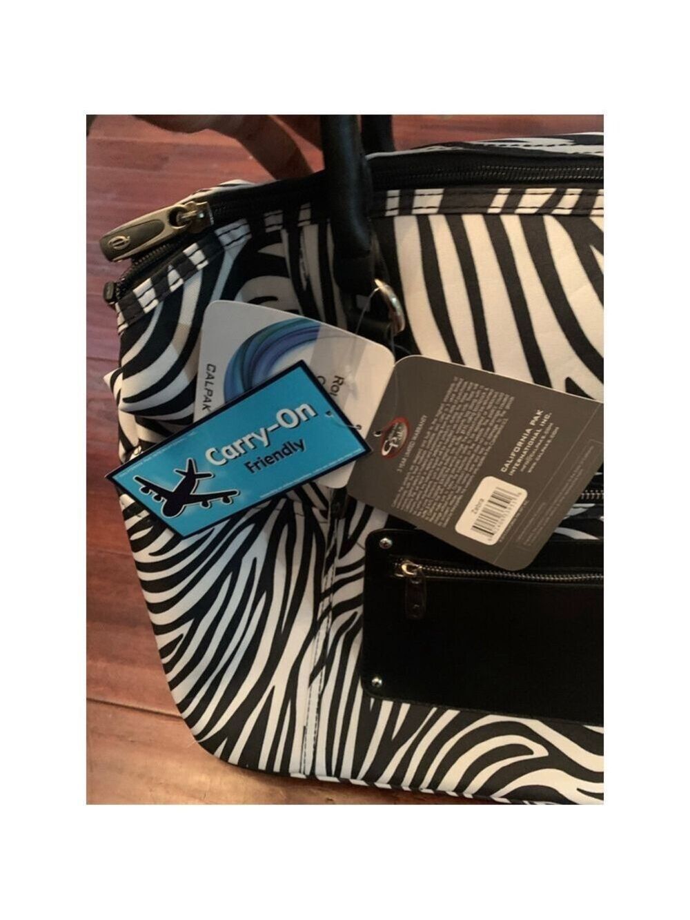 Women's CALPAK Rolling Duffel Bag Zebra Print Carry-On - Picture 3 of 6